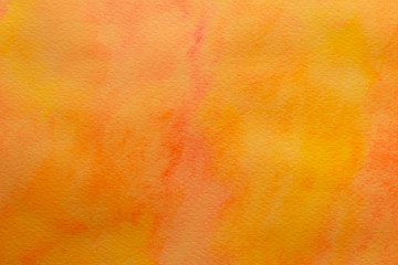 Bright orange background. Creative template with mixing gradient. Paper canvas with yellow ink. Watercolor texture, aquarelle pattern.