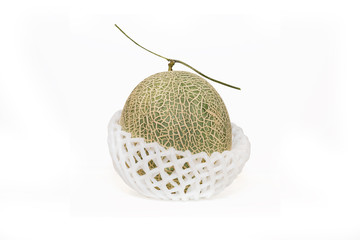 Green Melon, cantaloupe on net isolated white background