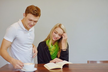 Caucasian couple is drinking coffee at restaurant