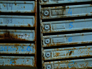 Old mailboxes in an apartment building. Rust and texture