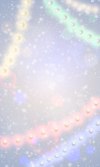 Obraz premium Vector colorful christmas lights snowfall vertical background. Xmas glowing garland in snow. Neon new year light festive snowy decoration. Yellow, red, pink, blue, green color shining bulbs and sparks