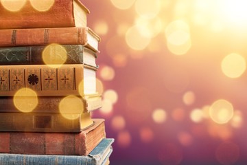 Old Books stacked on background.