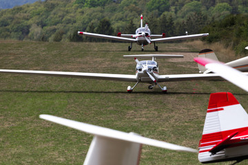 sports airplanes on an airfield