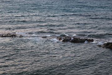 Fototapeta premium Rocks in the sea with waves