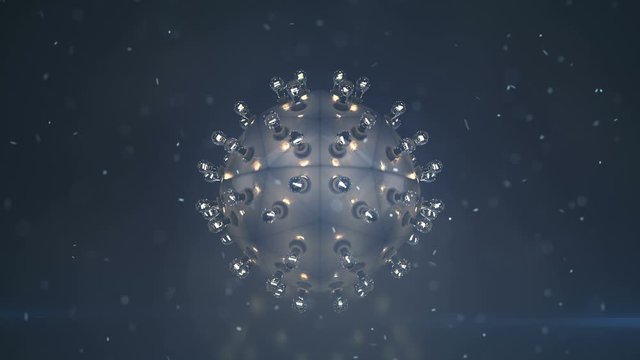 Metallic ball with edison style lightbulbs in fog and flying particles