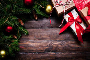 Christmas card close-up, fir tree with cones and gifts