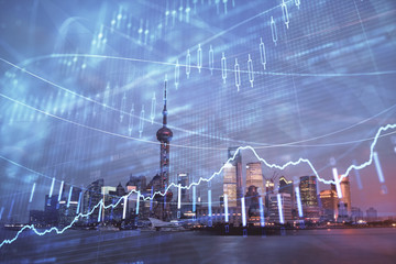 Forex chart on cityscape with tall buildings background multi exposure. Financial research concept.