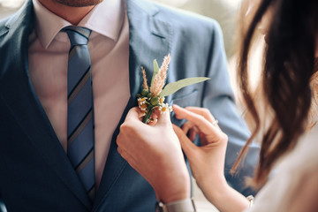 Bride and groom posing at country side