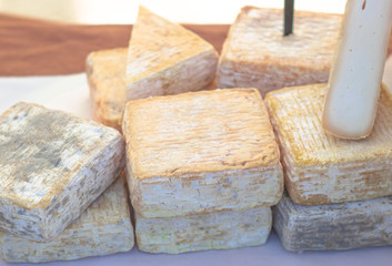 forms of exquisite Italian artisan cheese made with goat's milk