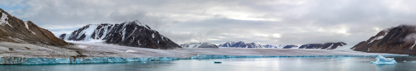 Panorama of a glacier and mountains in Ellesmere Island, part of the Qikiqtaaluk Region in the Canadian territory of Nunavut.