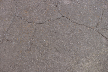 old asphalt on the road close-up