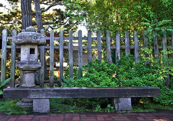 Scene from the walkway of a beautiful majestic peaceful Japanese garden  