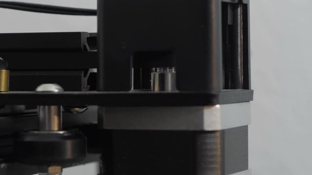 Stepper motor in 3d printer. Close up footage of working stepper motor in 3d printer.