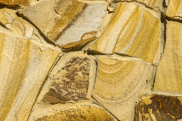 Texture of beautiful sandstone masonry of modern time. Close up