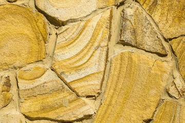 Texture of beautiful sandstone masonry of modern time. Close up