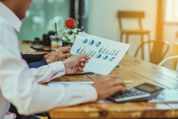 Business Corporate team brainstorming with chart and checking and analysis