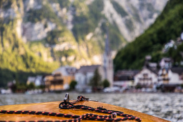 Hallstadt, Austria - July 2019: Picturesque old small town Hallstadt is Austrian state of Upper Austria. View from boat.