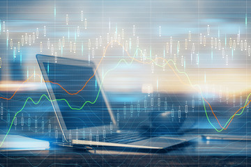 Double exposure of forex chart and work space with computer. Concept of international online trading.