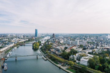 Obraz premium Frankfurt am Main Aerial view with drone. Looking towards the central bank. Main river flowing near Frankfurt. Frankfurt am Main Germany 30.10.2019