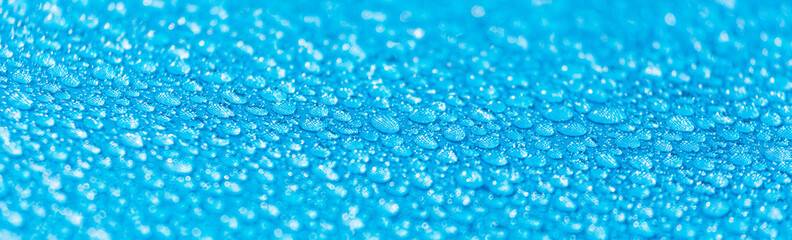 Raindrops on a tent as an abstract background