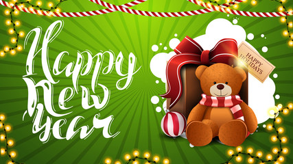 Obraz na płótnie Canvas Happy New Year, green horizontal greeting card with beautiful lettering, Christmas decor and present with Teddy bear
