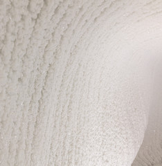 White walls of ice and snow in a cave