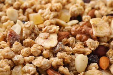 Healthy crunchy granola as background, closeup view
