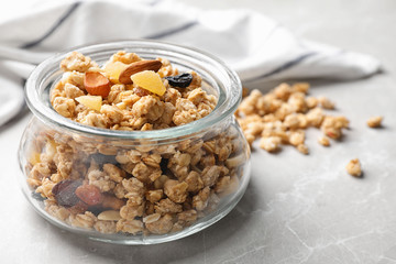 Tasty homemade granola on light table. Healthy breakfast