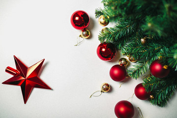 Christmas tree and ornaments on the white background isolated. Red and golden christmas balls. Red star on the white.