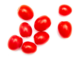 Red cherry tomatoes on a white background