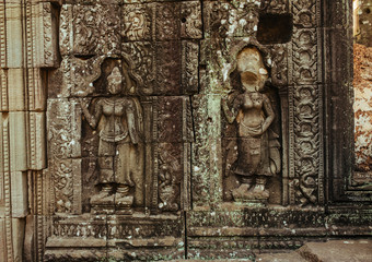 Acient Murals and cave paintings on Agkor Wat temple walls