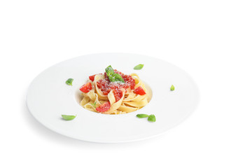 Tasty pasta with tomatoes, cheese and basil on white background