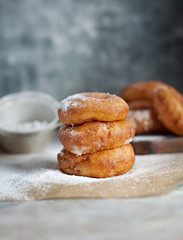doughnuts in powdered sugar