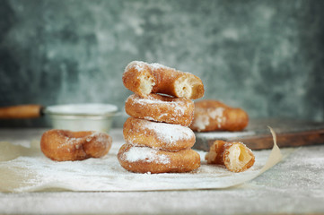 doughnuts in powdered sugar