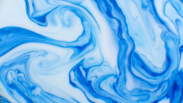 Blue Colorful Ink Liquid Reaction abstract colour ink background. Blue and white chemical reaction