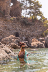 Fototapeta premium Summer vacation concept. Female posing in swimwear