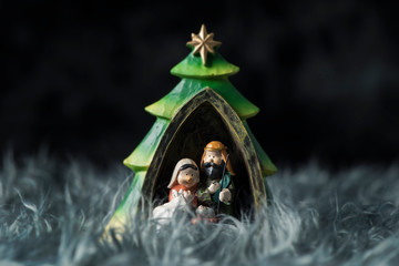 the holy family on a gray artificial fur