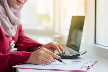 businesswoman working with documents in office