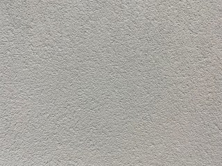 Grainy gray wall in cold color palette