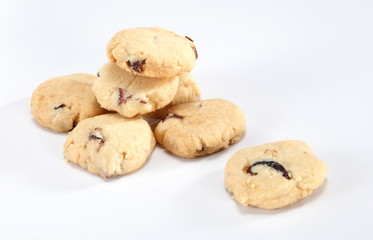 A cookie is a baked food that is typically small, flat and sweet. It usually contains flour, sugar and some type of oil or fat. It may include other ingredients such as raisins, oats, chocolate.