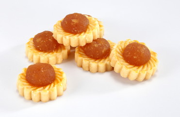 Pineapple tarts or nanas tart are small, bite-size pastries filled or topped with pineapple jam