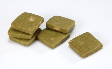 A cookie is a baked food that is typically small, flat and sweet. It usually contains flour, sugar and some type of oil or fat. It may include other ingredients such as raisins, oats, chocolate.