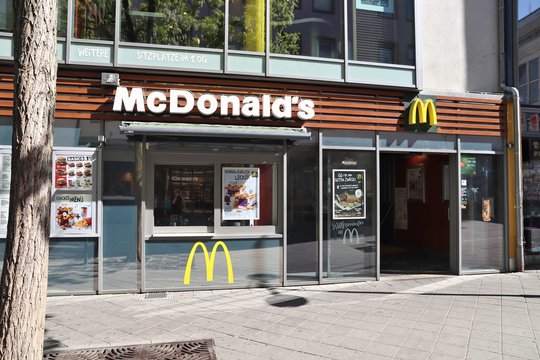 NUREMBERG, GERMANY - MAY 7, 2018: McDonald's Restaurant In Nuremberg, Germany. McDonald's Is One Of Largest Fast Food Chains Worldwide.