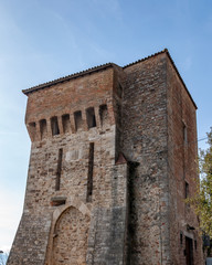 Todi in Umbria, Italy. View of the ancient village full of medieval buildings. It rises on the hills since the Etruscan times and overlooks the valley of the Tiber river.