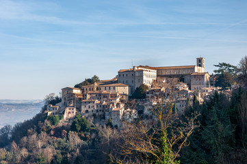 Fototapeta na wymiar Todi in Umbria, Italy. Rich in medieval buildings such as the Palaces of the People and the Captain. It rises on the hills since the Etruscan times and overlooks the valley of the Tiber river.