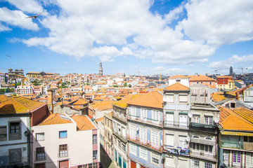 Fototapeta premium a panoramic view of the rood tops and the buildings in the old town of Porto in Portugal 