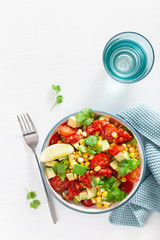 healthy vegan avocado sweetcorn tomato salad