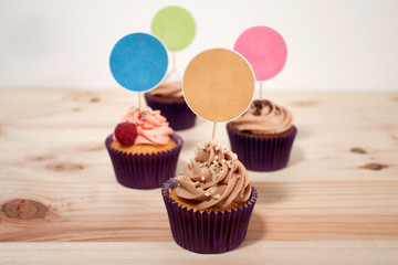 Homemade cupcakes on wood table