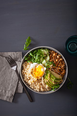 quinoa bowl with egg, avocado, cucumber, lentil. Healthy vegetarian lunch