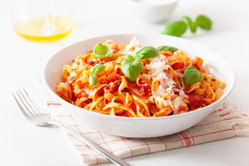 tagliatelle pasta with tomato sauce parmesan basil